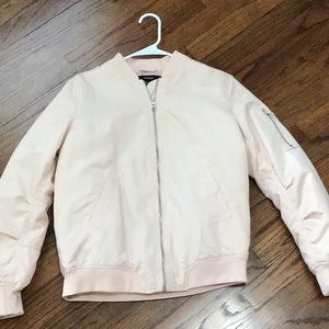 Blush bomber jacket with zipper detail